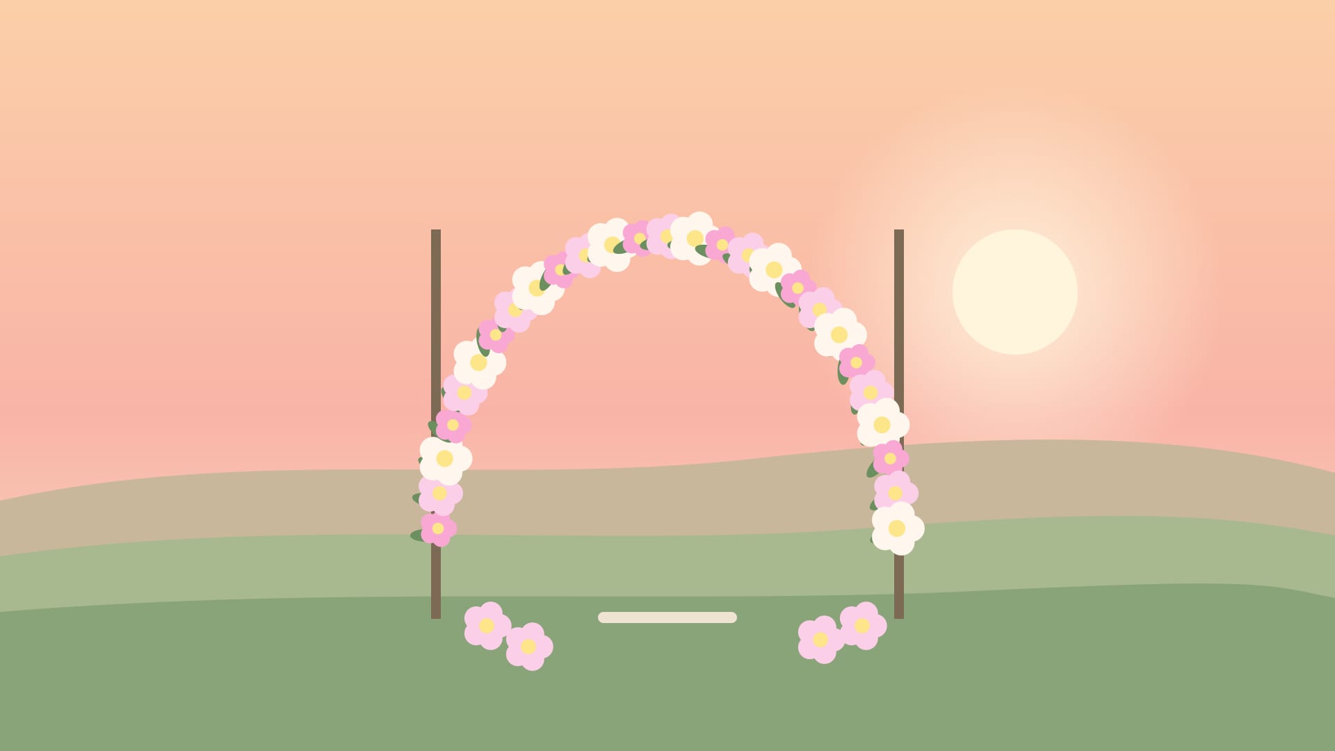 A floral arch on a hill at sunset
